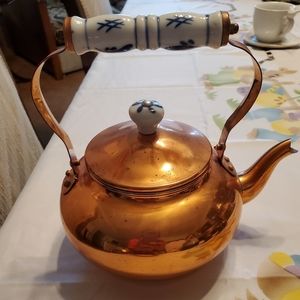 Brass tea pot with beautiful handle